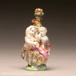 Scent bottle in the form of cupid in the guise of a doctor with companion