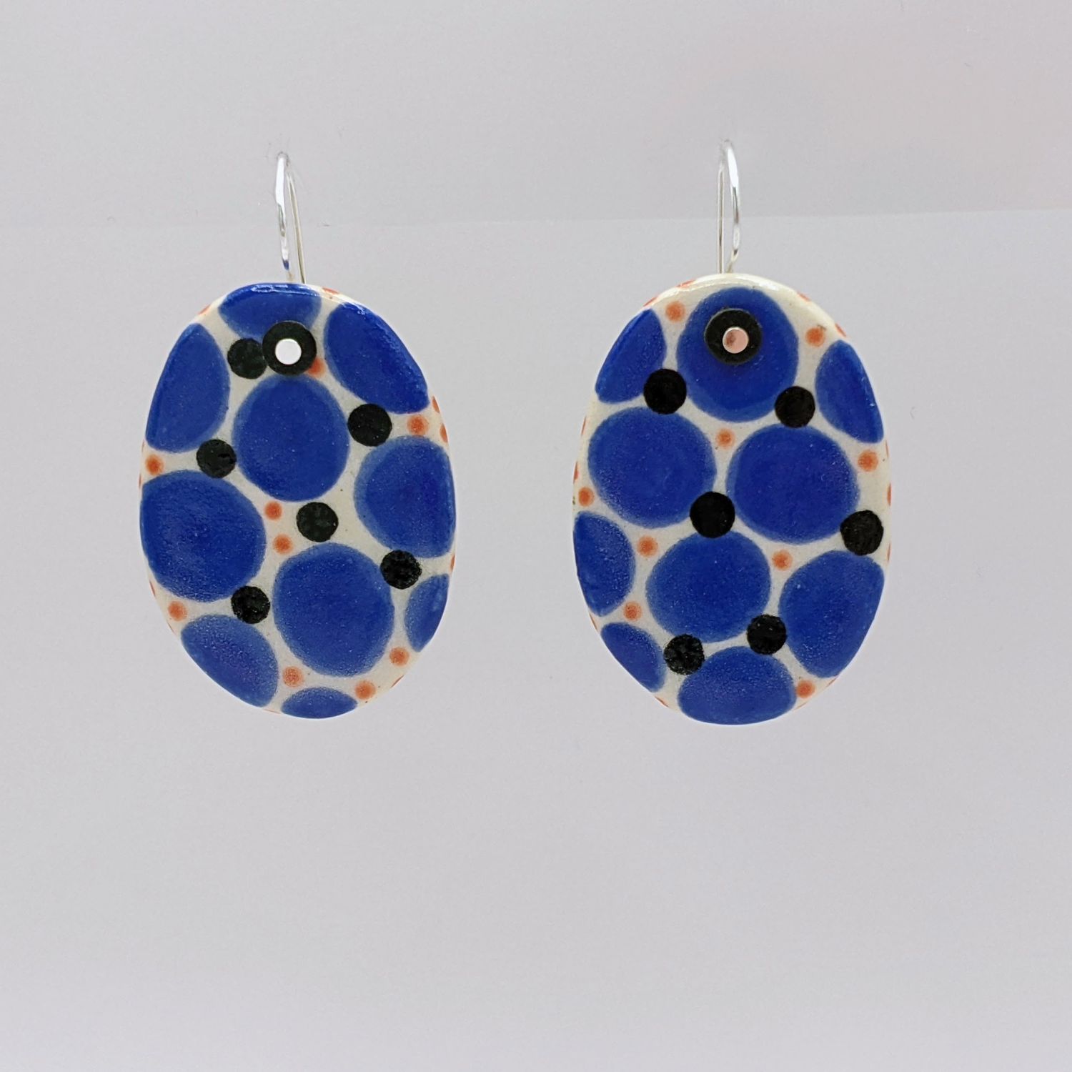 Here and Here: Blue Dotted Ceramic Disc Earrings Product Image 1 of 3