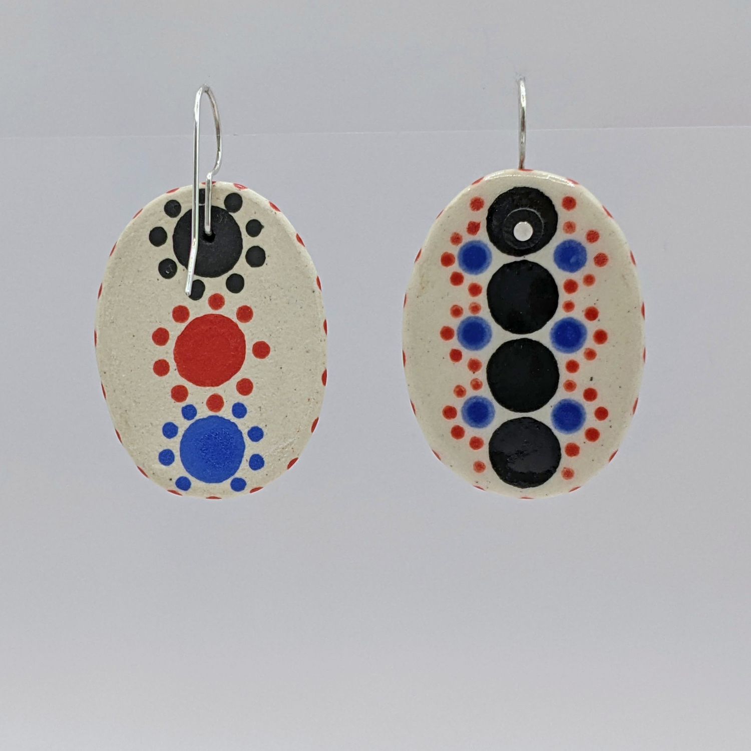 Here and Here: Black and Multi-Coloured Dotted Ceramic Disc Earrings Product Image 2 of 3