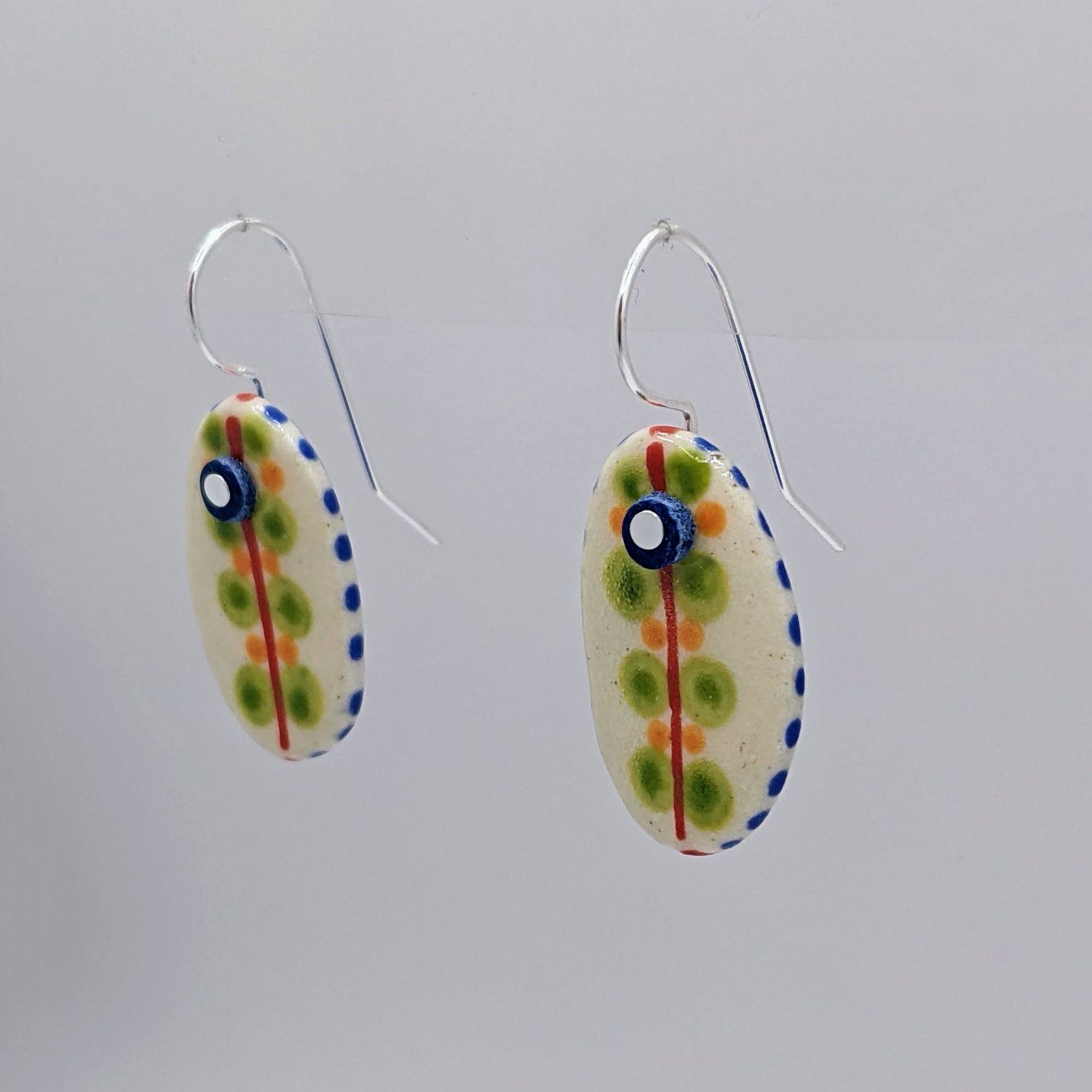 Here and Here: Green Dotted Ceramic Disc Earrings Product Image 4 of 4