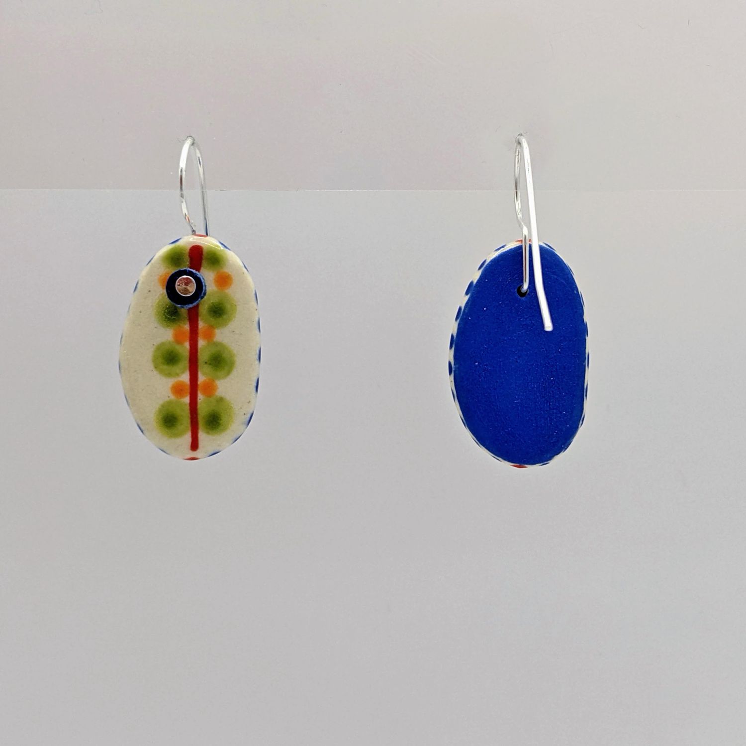 Here and Here: Green Dotted Ceramic Disc Earrings Product Image 3 of 4