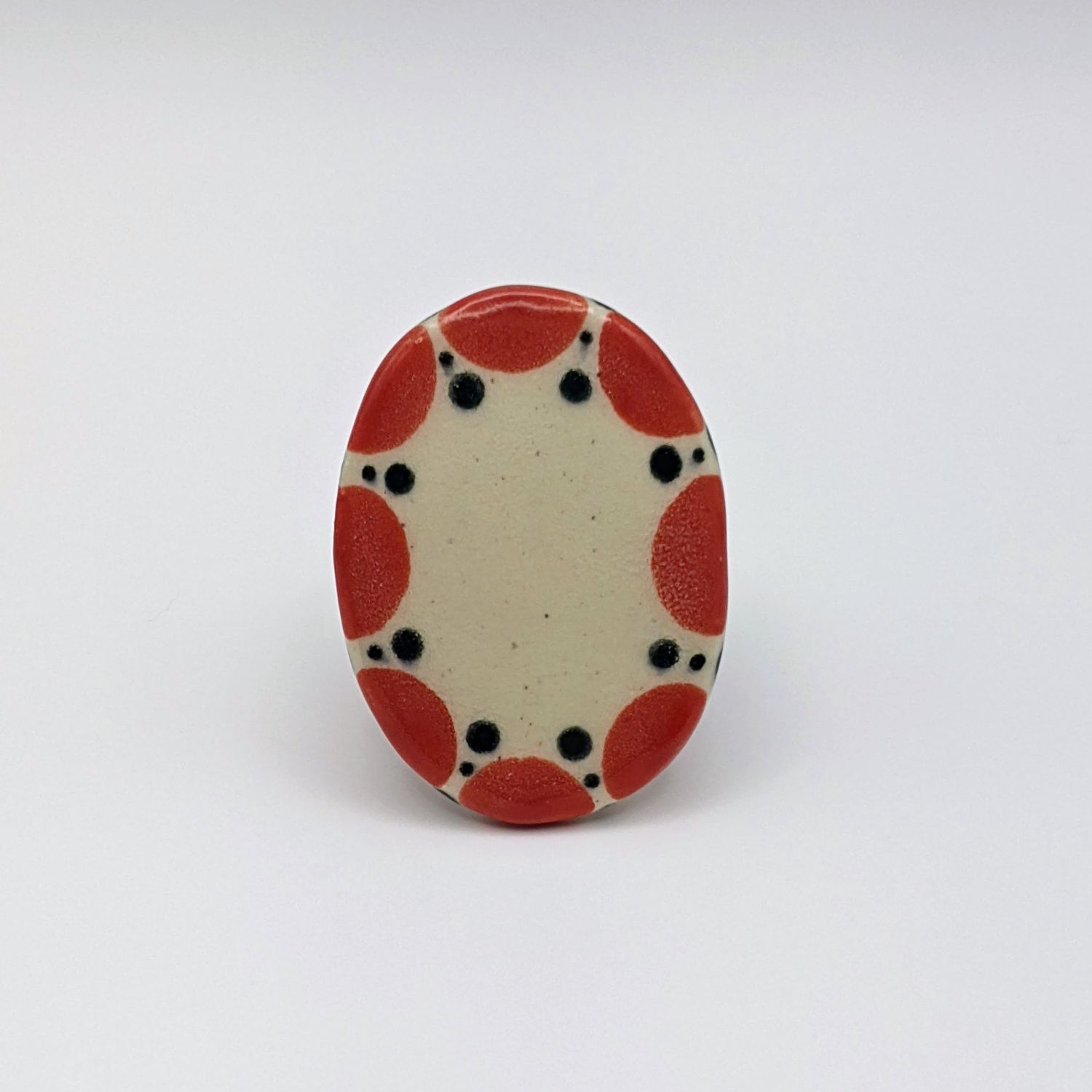 Here and Here: Red and Black Dot Ceramic Ring – Small Product Image 1 of 2