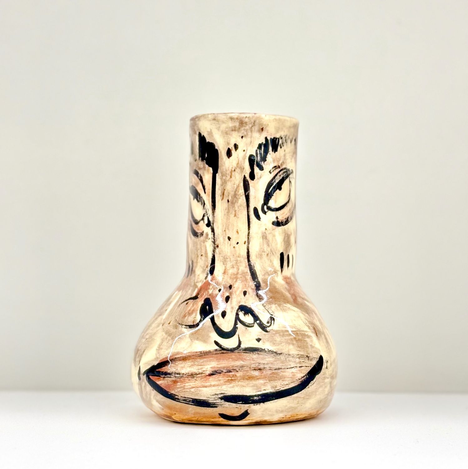 Enas Satir: Grey vase with face Product Image 1 of 4