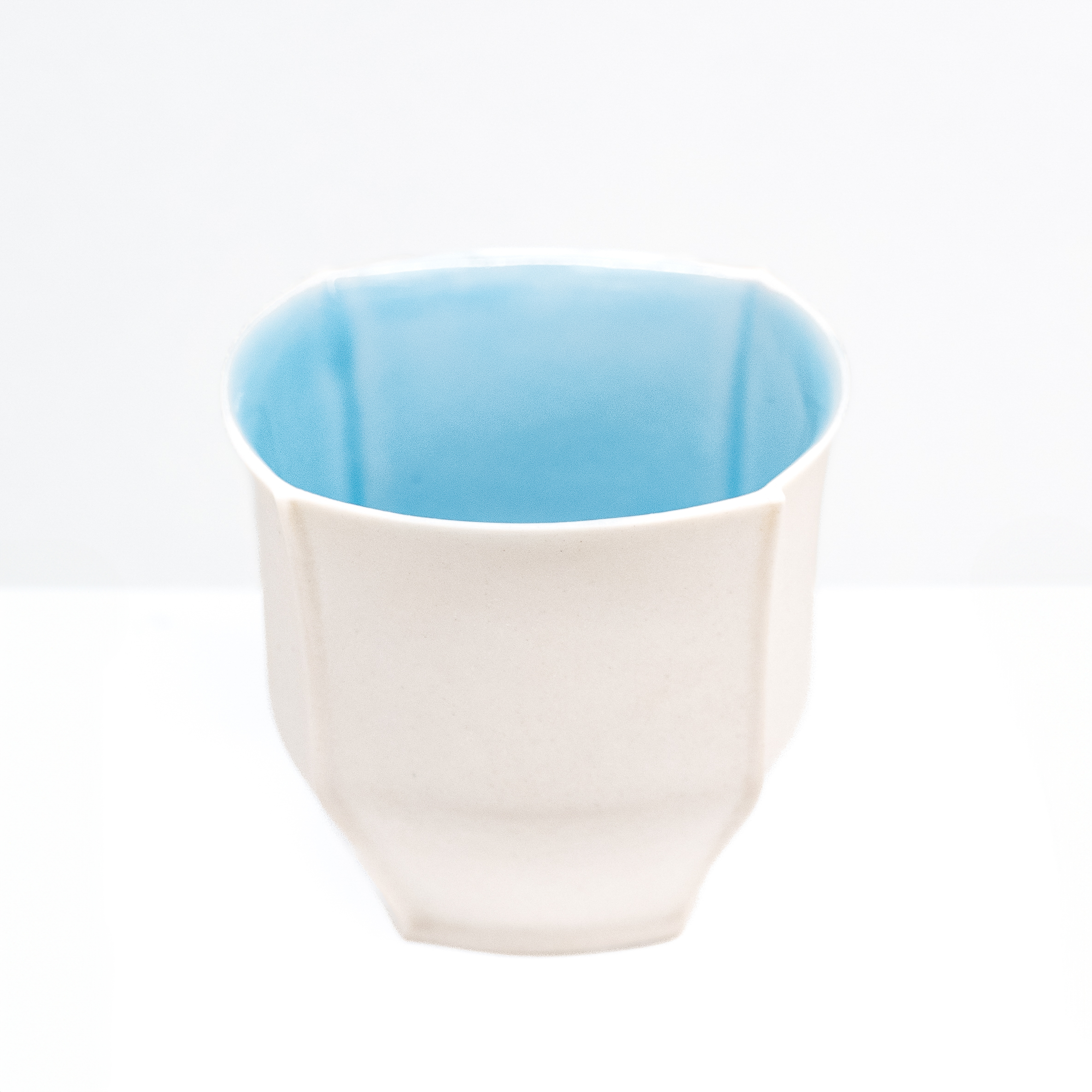 Nicolette Keaney: Small Porcelain Cup with Blue Interior Product Image 1 of 4