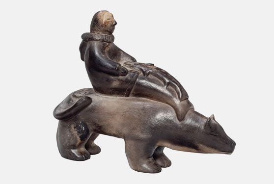 Inuit ceramic sculpture of Sedna riding a bear
