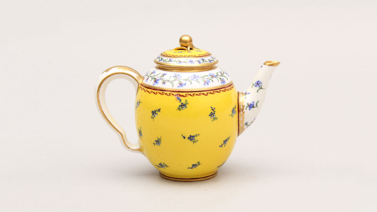 Yellow porcelain teapot