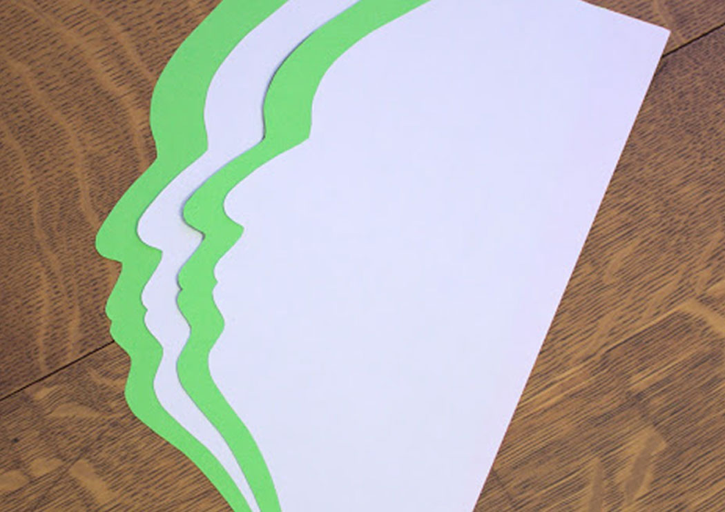 Four paper silhouettes