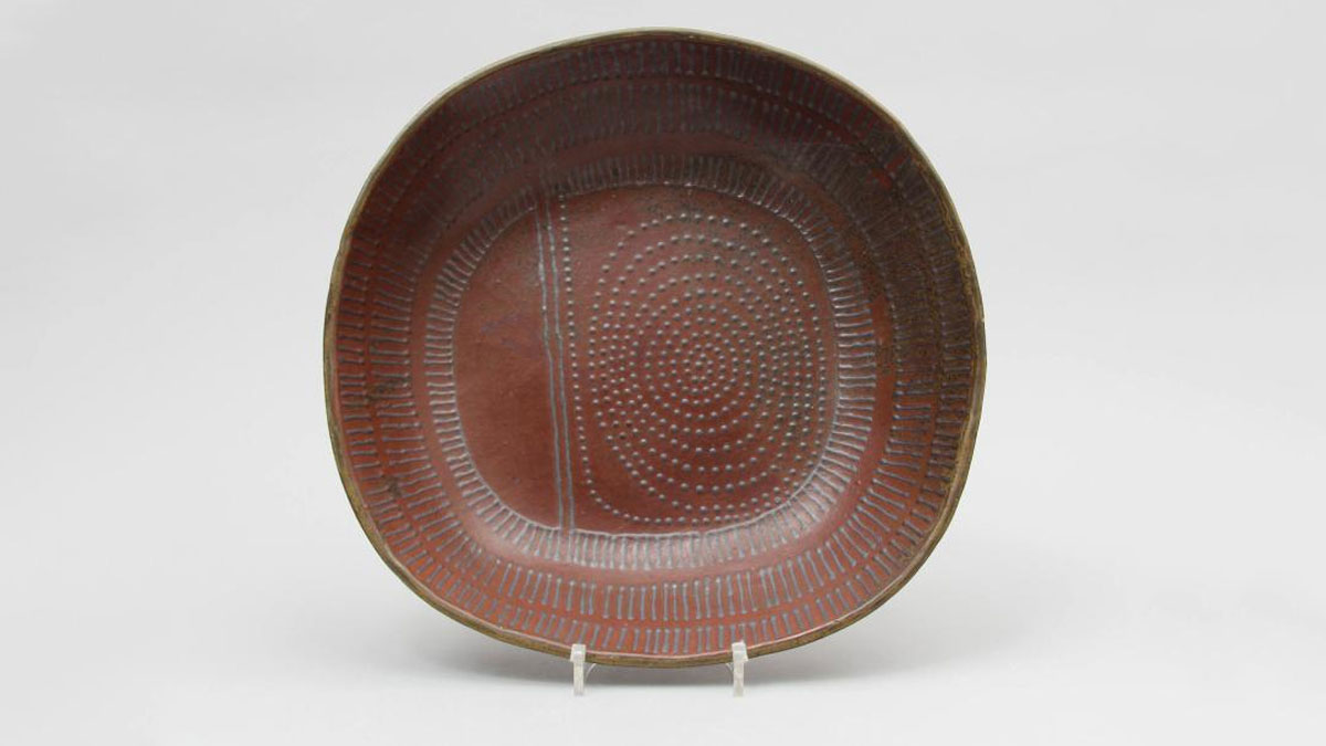 Red ceramic plate by Siddig El Nigoumi