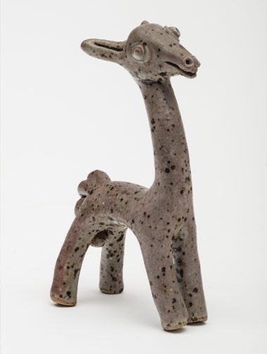 A ceramic llama-like figurine