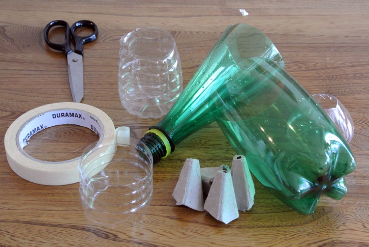 Cut up water bottles and egg carton, alongside tape and scissors