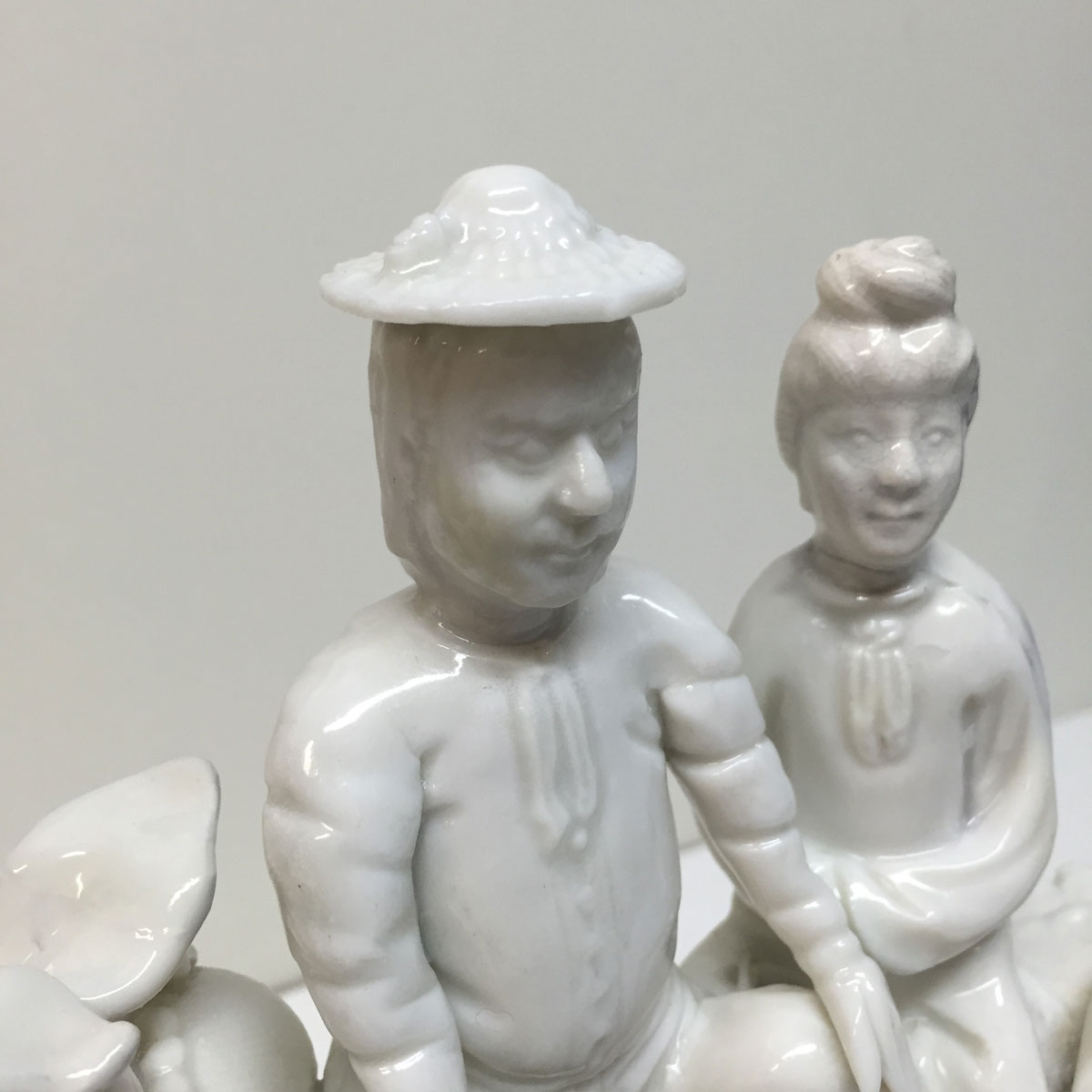 Two white porcelain figures