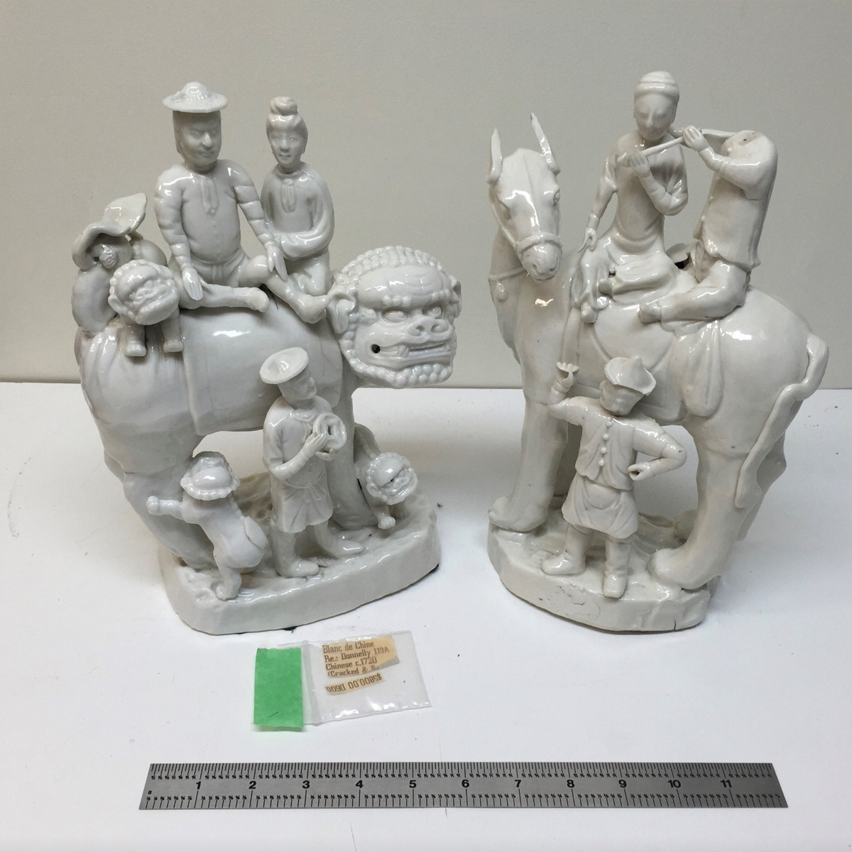 Two white porcelain figure groupings