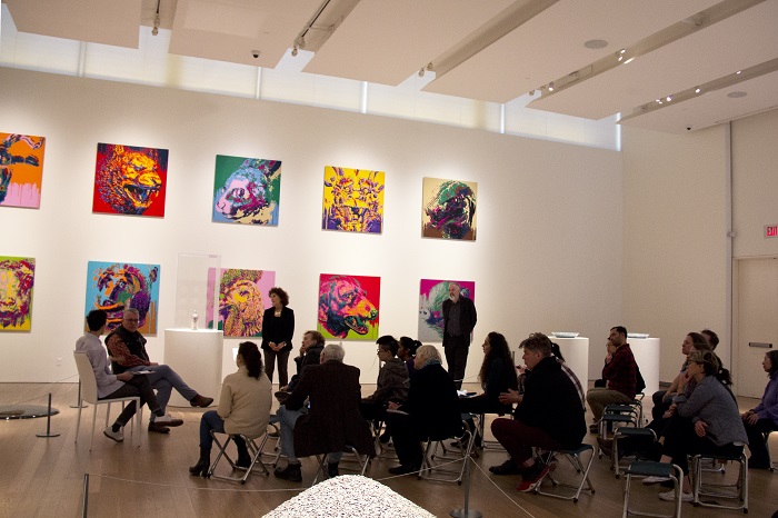 People attending a workshop in the exhibition Ai Weiwei: Unbroken