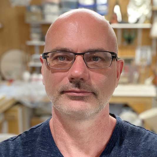 Portrait of artist Laurent Craste in the studio