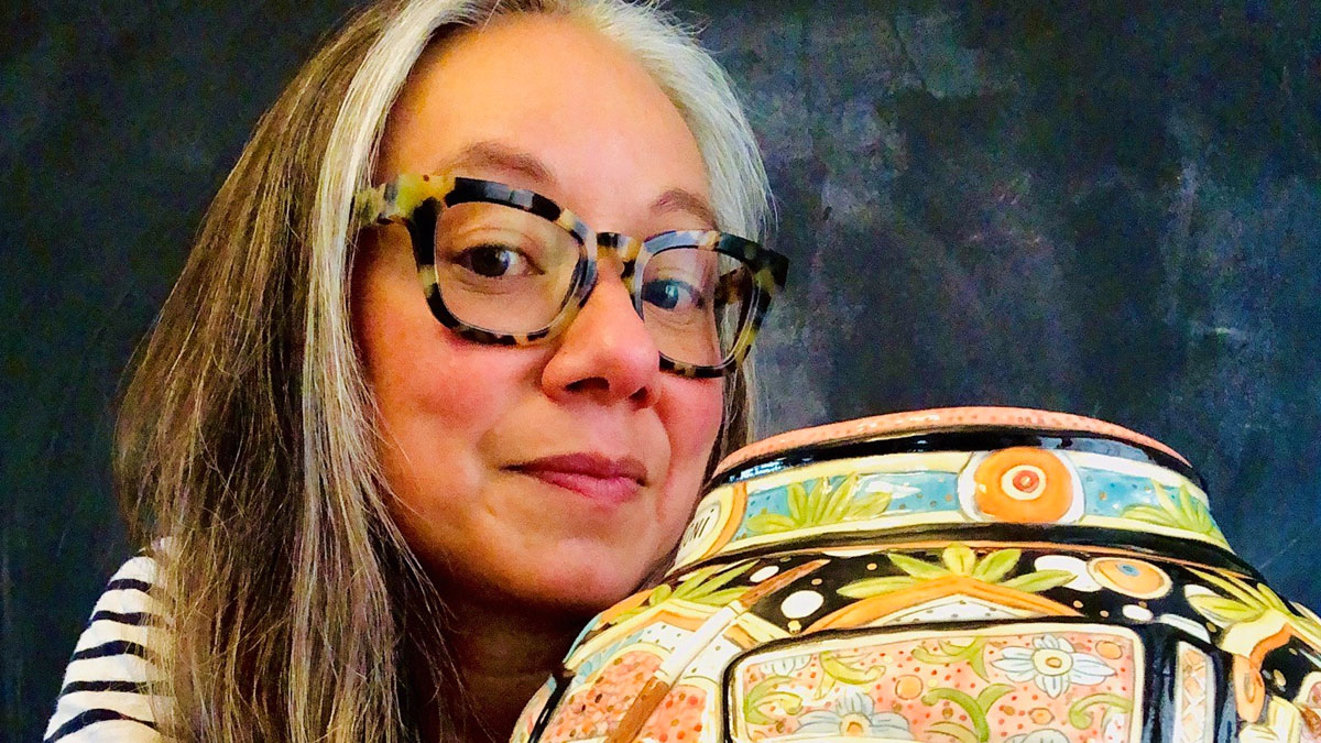 Artist Mariko Paterson with a ceramic vase