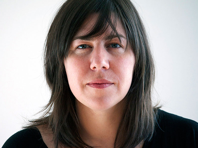 A headshot of artist Nadia Myre seen from the neck up