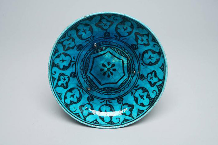 A turquoise-blue dish from Iran