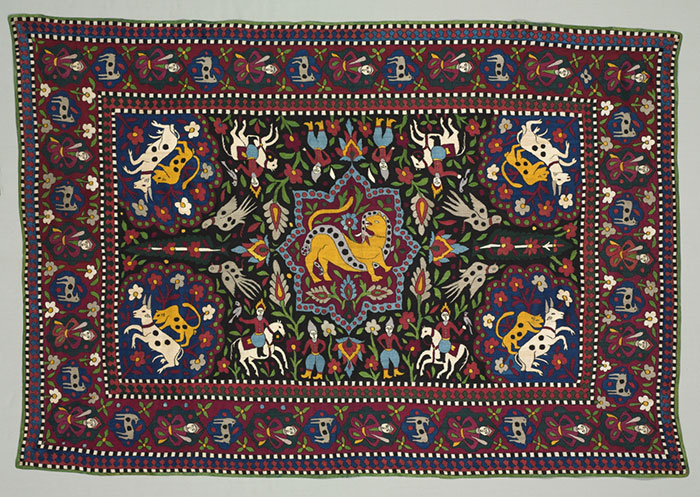 A silk embroidered floor cover from Iran