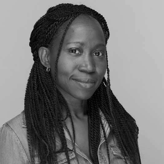 A black-and-white portrait of a Black woman with braids