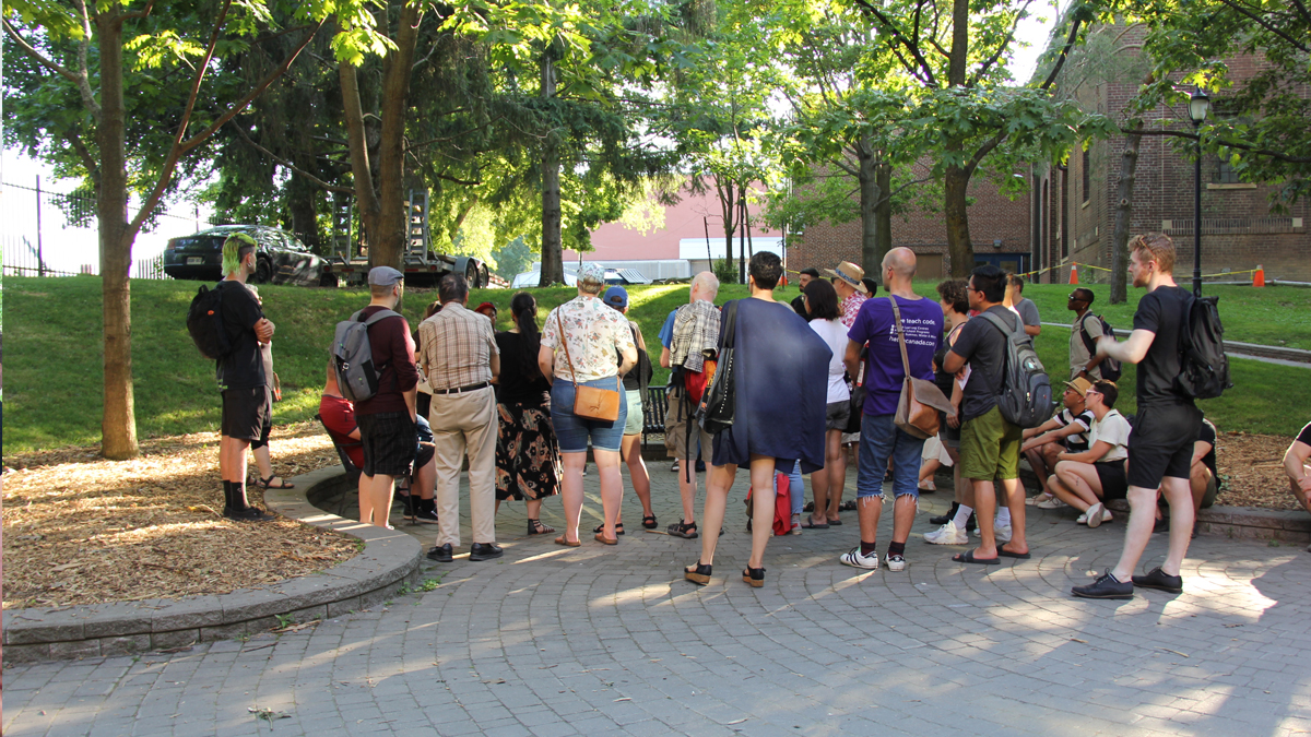 Participants taking part in a walking tour in Queen's Park