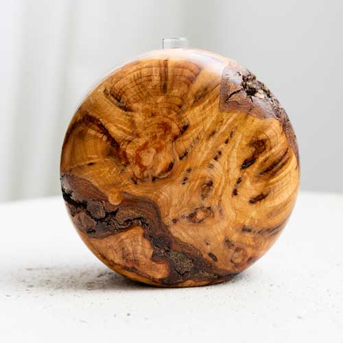A round wood vase
