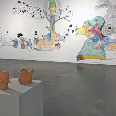 Wall mural and ceramic objects on plinths